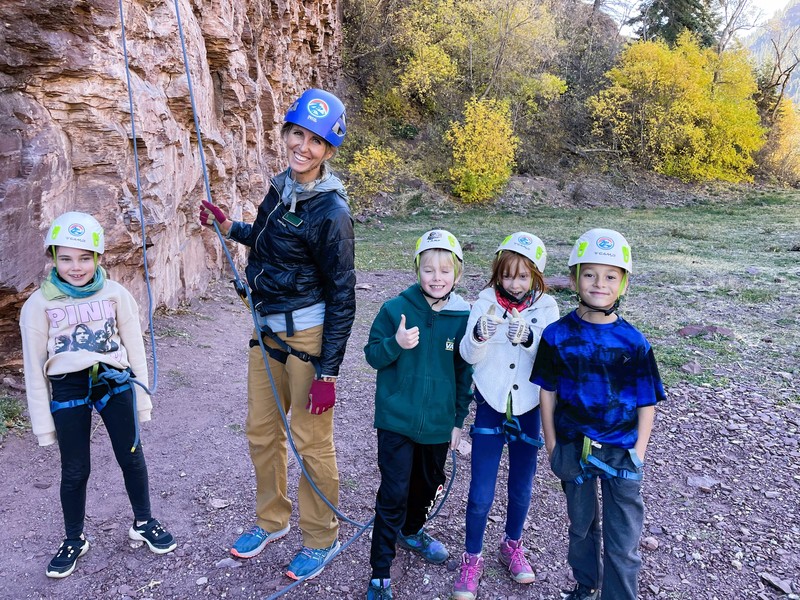 4 students and teacher in climbing gear
